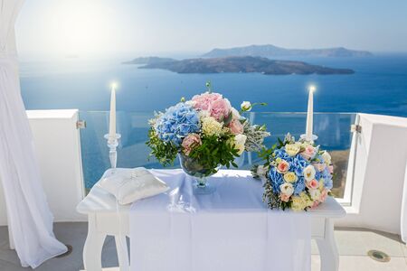 Table and decorations for a wedding on the island of Santorini, Greeceの写真素材