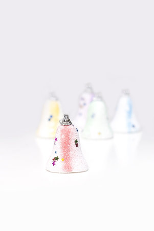 christmas bell decorations with white backgroundsの写真素材