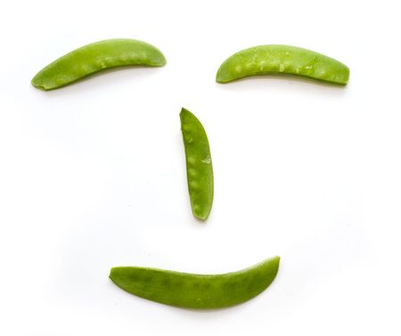 Snap Peas smile face isolated on Whiteの写真素材
