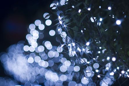 Defocused light dots against black backgroundの写真素材