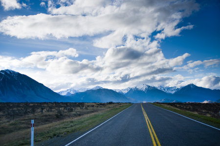 road under cloudy sky
