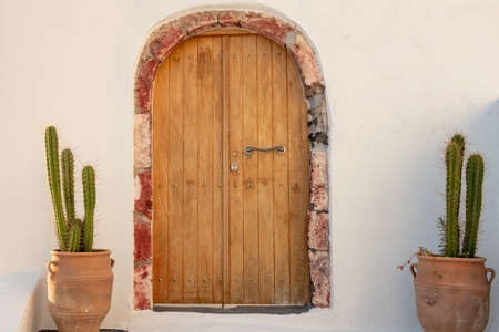 Traditional Aegean architecture wooden door.の写真素材