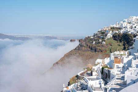 Anedosa sea fog covering the Santorini calderaの写真素材