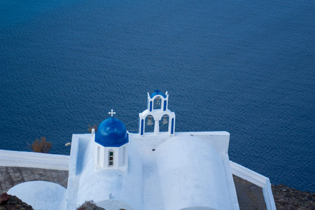Blue dome church in Imerovigli village, Santorini island, Greece.