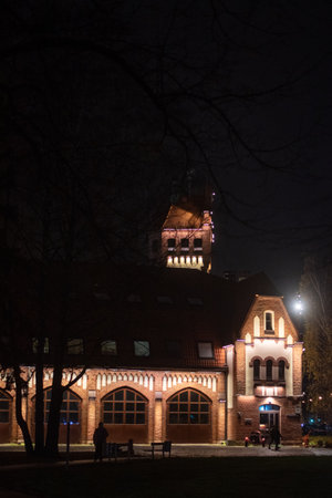 Old brick fire house at night.の写真素材