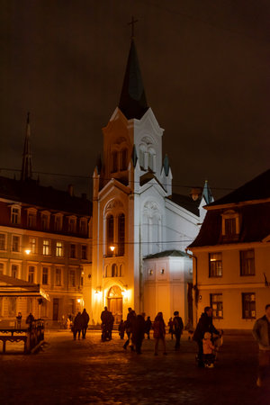 A church at night in a square.の写真素材