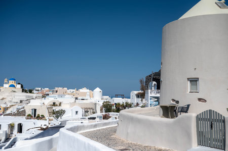 The view in Oia village, Santorini island, Greece. White buildings....の写真素材