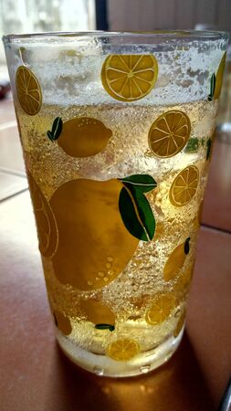 Close up a glass of drinkingの写真素材