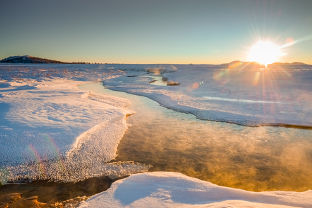 Scenic view of a half-frozen riverの写真素材