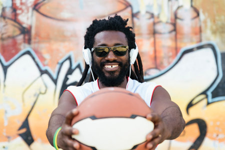 Portrait of African Man with Casual Sport wear and basket ball.