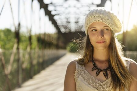 Closeup portrait of a girl in autumn park.の写真素材