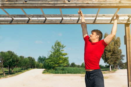 Fitness, workout, sport, lifestyle concept. Man training fitness in the sport area.