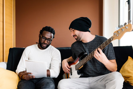 Artists producing music in their home sound studio.の写真素材