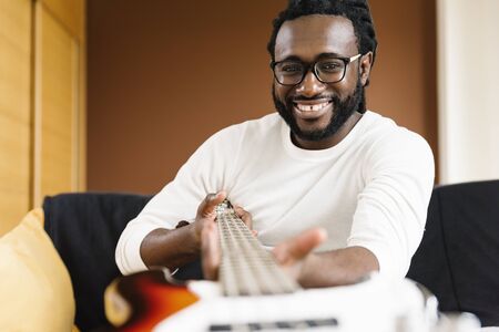 Artist producing music in his home sound studio.の写真素材