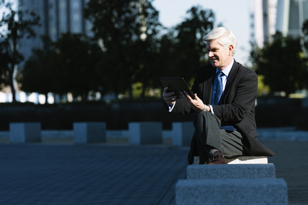Senior Businessman in the Street. Business Conceptの写真素材