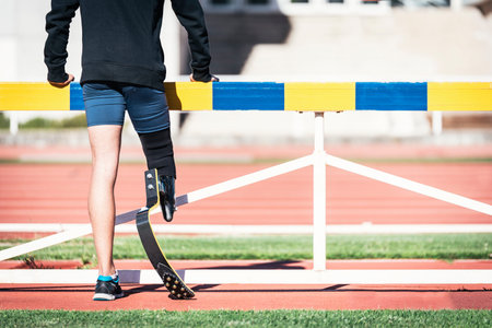Close up disabled man athlete with leg prosthesisの写真素材