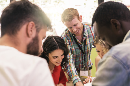 Teacher explaining the lesson to his students.の写真素材