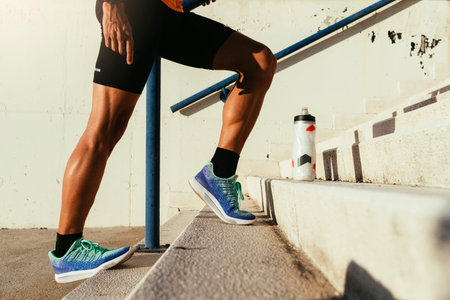Close up of legs stretching. Fitness, workout, sport, lifestyle concept.