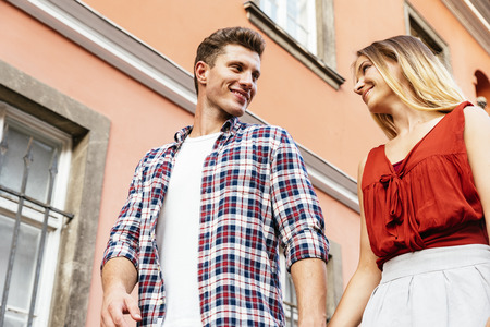 Romantic Young Couple Walking in the City. Relationship concept.の写真素材