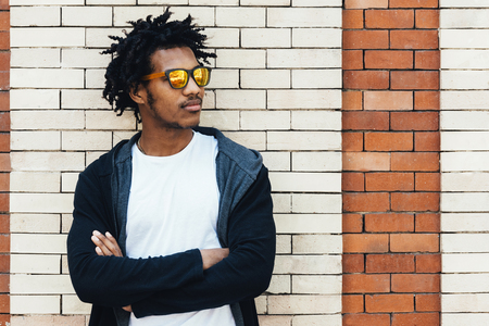 Portrait of handsome afro man in the street.の写真素材