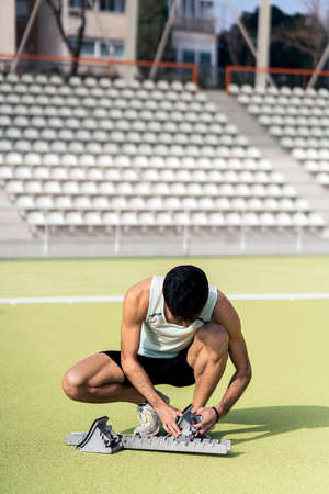 Male Athlete on Sports Trackの写真素材