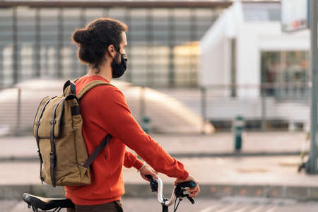 Man Riding Bike in the Cityの写真素材