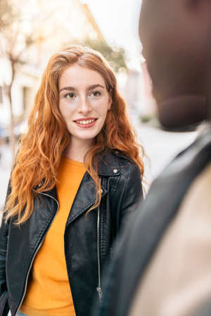 Young Loving Multiethnic Couple Smilingの写真素材