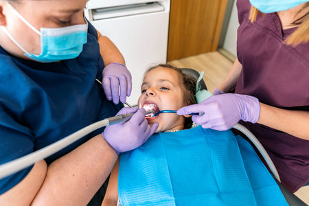 Young Beautiful Girl In Dentistの写真素材