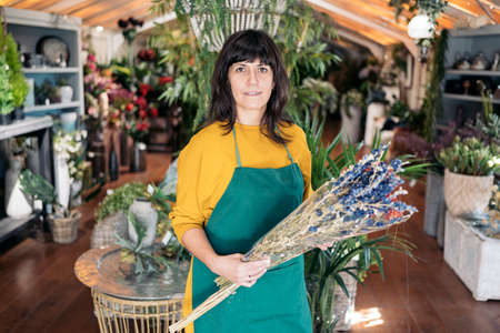 Beautiful Woman With Flowers Portraitの写真素材