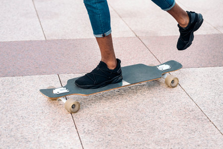 Young Faceless Skater Boy Practicing