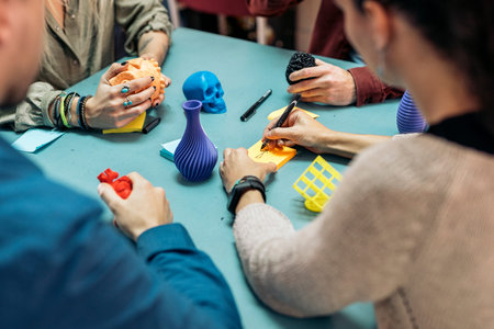 Stock photo of business people during meeting in 3d printing business.