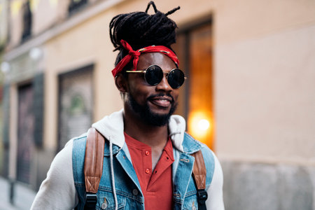 Stock photo of attractive and young african american boy wearing sunglasses.の写真素材