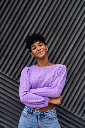 Stock photo of cool african girl smiling and looking at camera.の写真素材
