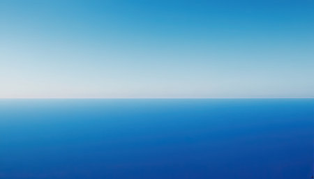 Blue sky and sea as seen through window of an aircraft. View from airplane window.の素材