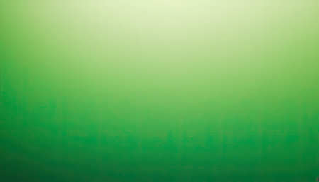 green abstract background with some smooth lines in it and some shades on itの素材