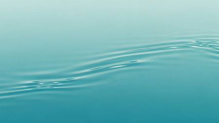Close up of water surface with ripples on it. Abstract background.の素材