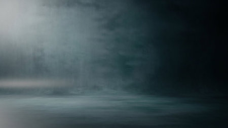 A dark studio space is filled with swirling smoke and mist. A bright light source on the left casts rays and illuminates the smoky atmosphere, creating a dramatic and moody effect. The floor is dimly lit, reflecting the haze.の素材
