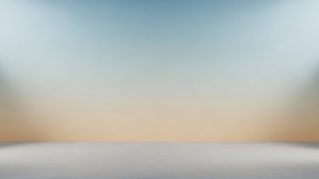 A blurred studio background featuring a smooth gradient transitioning from a soft blue at the top to a warm beige in the middle and a light grey floor at the bottom. Two soft spotlight effects are visible on the sides, illuminating the space. The image is clean and minimalist.の素材