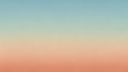 A smooth, subtle gradient transitions from a soft light blue at the top to a gentle peach color at the bottom.の素材