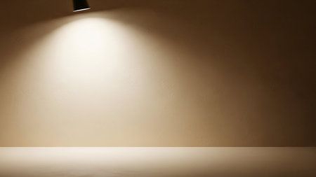 Floor showing spotlight on a textured wall and floor. High resolution image suitable for commercial use.の素材