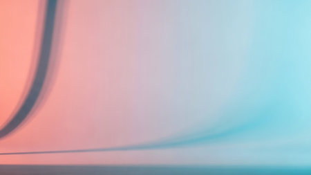 An abstract, soft-focus background with a smooth gradient transitioning from pink to blue, creating a gentle and ethereal atmosphere.の素材