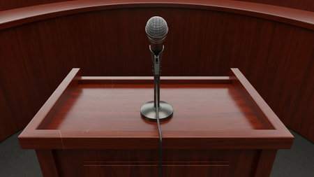A classic wooden podium with a vintage microphone stands center stage against a curved, dark wood backdrop, ready for a speech or presentation.の素材