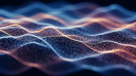 Abstract glowing waves of blue and orange particles create a dynamic and fluid motion effect against a dark background.の素材