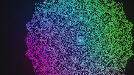 A detailed, symmetrical mandala with intricate patterns is displayed in a rainbow gradient of purple, blue, and green against a dark background.の素材