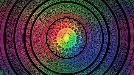 A vibrant rainbow-colored mandala with complex concentric patterns is displayed against a stark black background.の素材