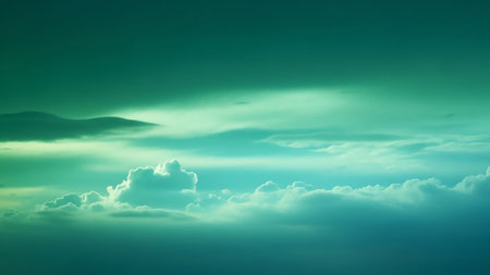 A serene sky filled with wispy clouds in shades of teal and turquoise, illuminated by soft, diffused light creating an ethereal atmosphere.の素材