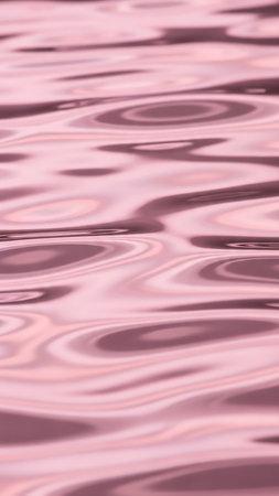 An abstract close-up of a pink water surface, showcasing gentle ripples and soft reflections creating a mesmerizing, fluid texture.の素材
