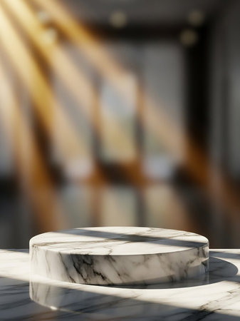 A circular marble pedestal sits on a marble surface, illuminated by dramatic sunbeams filtering through a softly blurred interior background.の素材