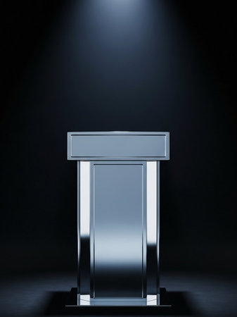 A minimalist silver podium with a clean, reflective surface, positioned under a subtle spotlight against a dark, moody background.の素材