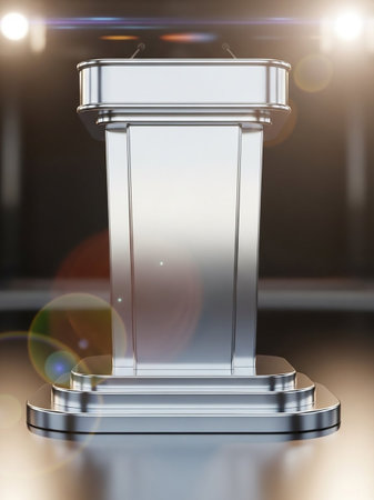 A sleek, silver podium with microphones is dramatically lit, featuring lens flares and reflections on its polished surface.の素材